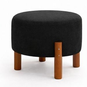 Puff redondo en tela negra con patas de madera vistas